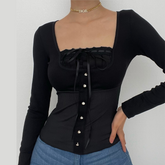 Solid long sleeve lace hem button self tie top