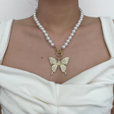 Faux pearl beaded butterfly pendant necklace