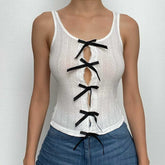 Bowknot hollow out contrast sleeveless textured cut out top