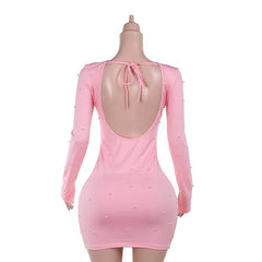Crewneck long sleeve beaded backless mini dress