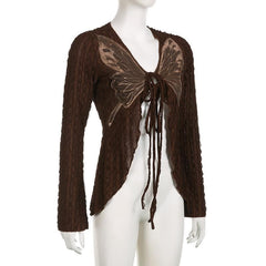 Textured butterfly pattern self tie long sleeve v neck crop top