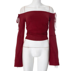 Off shoulder long sleeve ruched self tie top