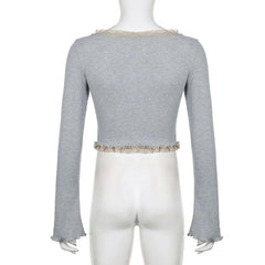 Ruffle solid ribbed contrast long sleeve cross front crop top