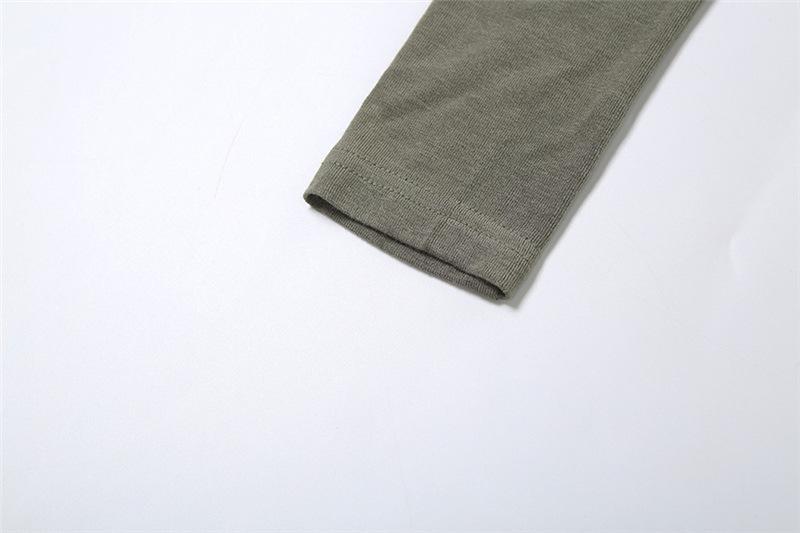 Long sleeve irregular hollow out ruched solid top