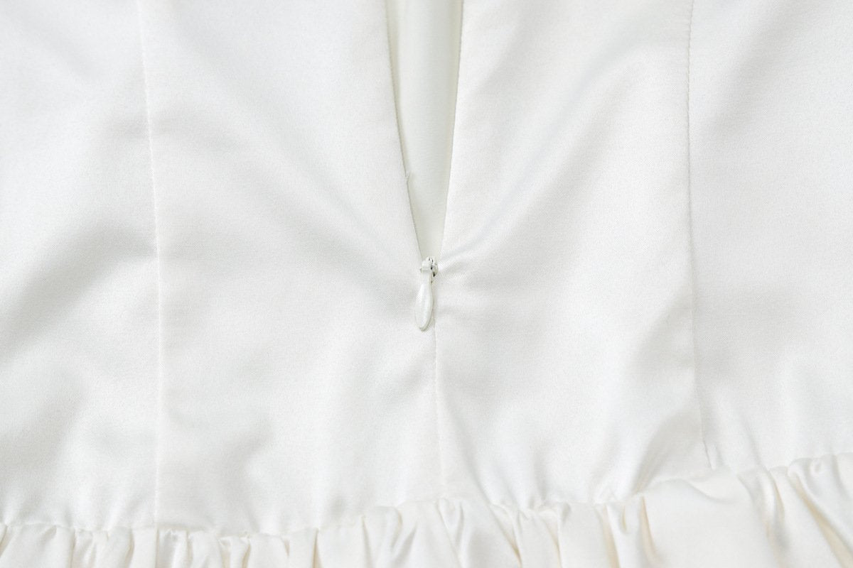 Halter ruched knotted solid mini dress