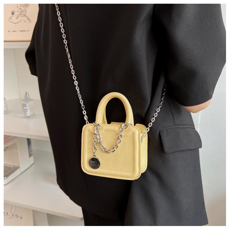 Solid metal chain crossbody bag