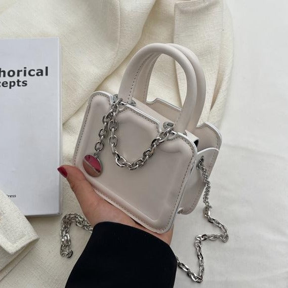 Solid metal chain crossbody bag