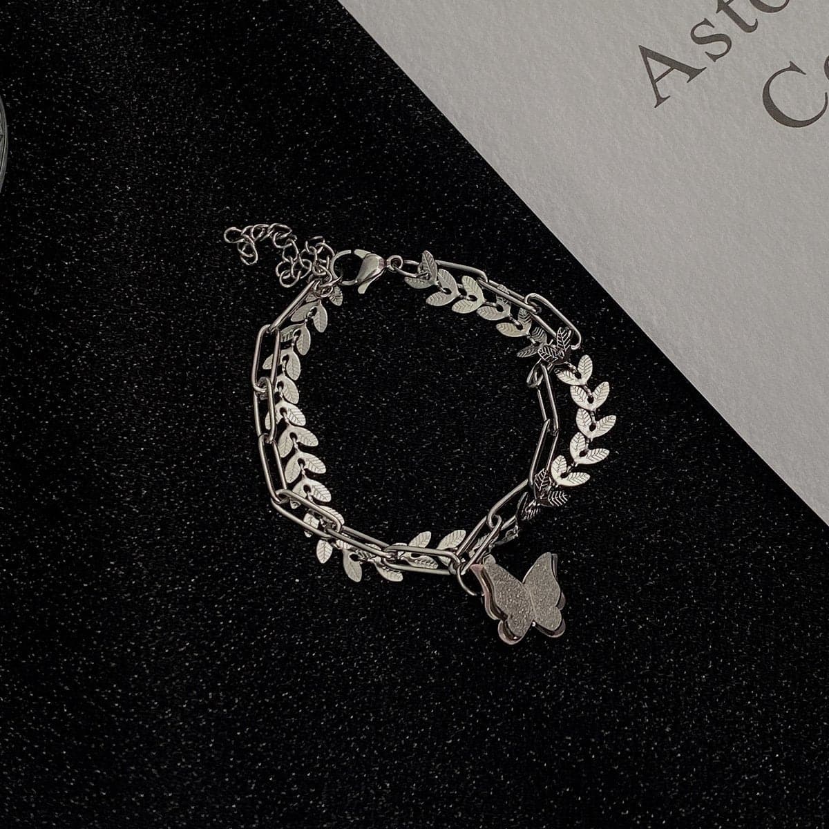 Butterfly pendant layered leaf bracelet