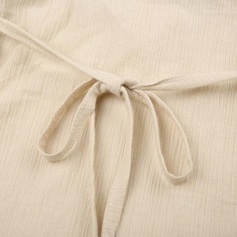 Textured v neck flared sleeve self tie top