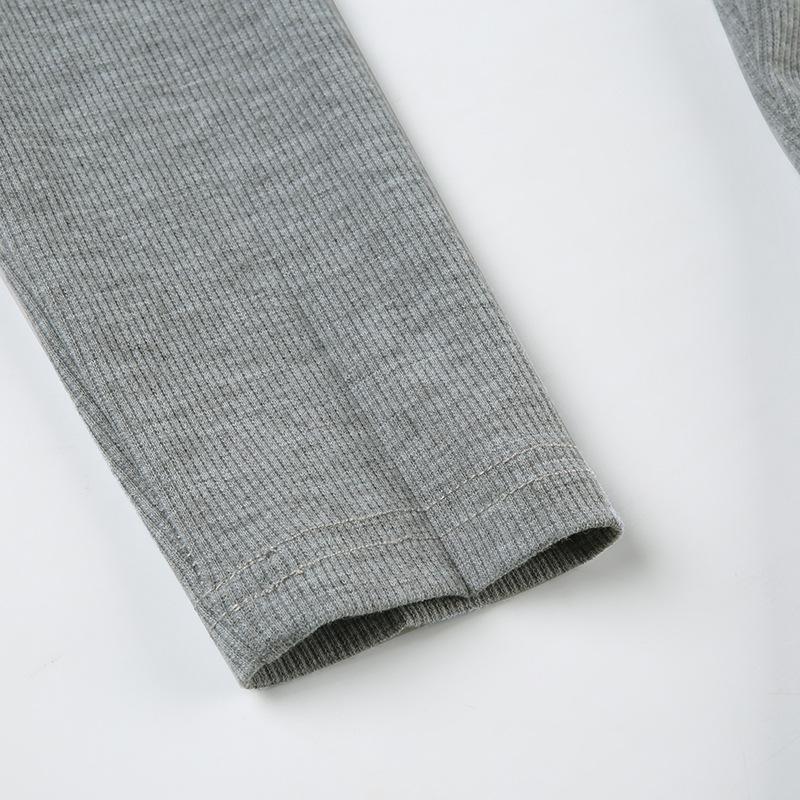 Long sleeve abstract ribbed button top