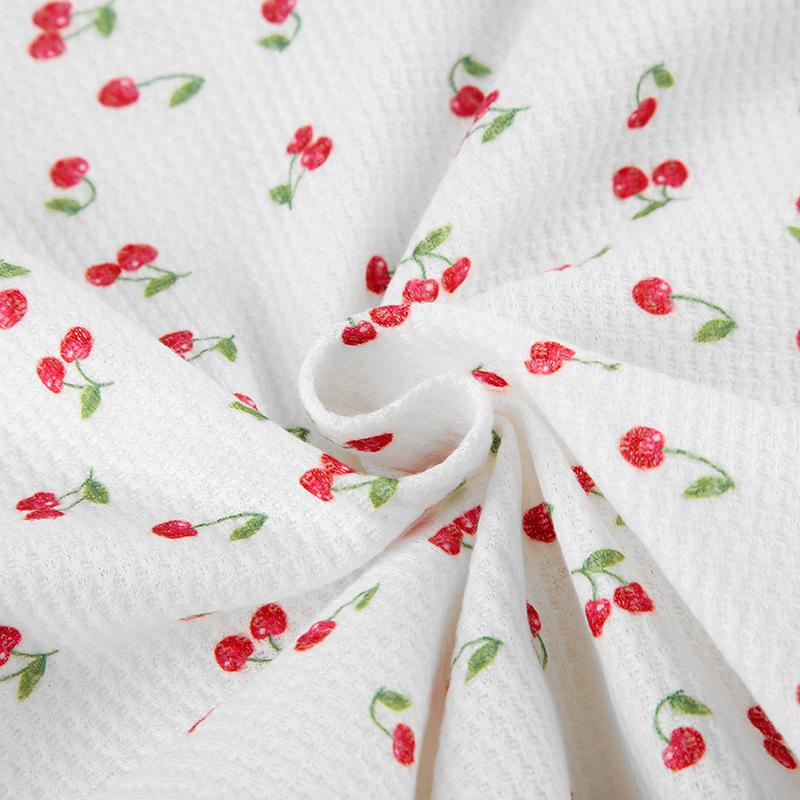 Cap sleeve textured cherry print bowknot lace hem top
