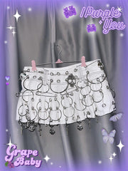 Skull o ring denim pleated mini skirt