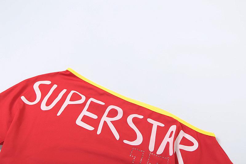 Short sleeve one shoulder “super starâ€?print top