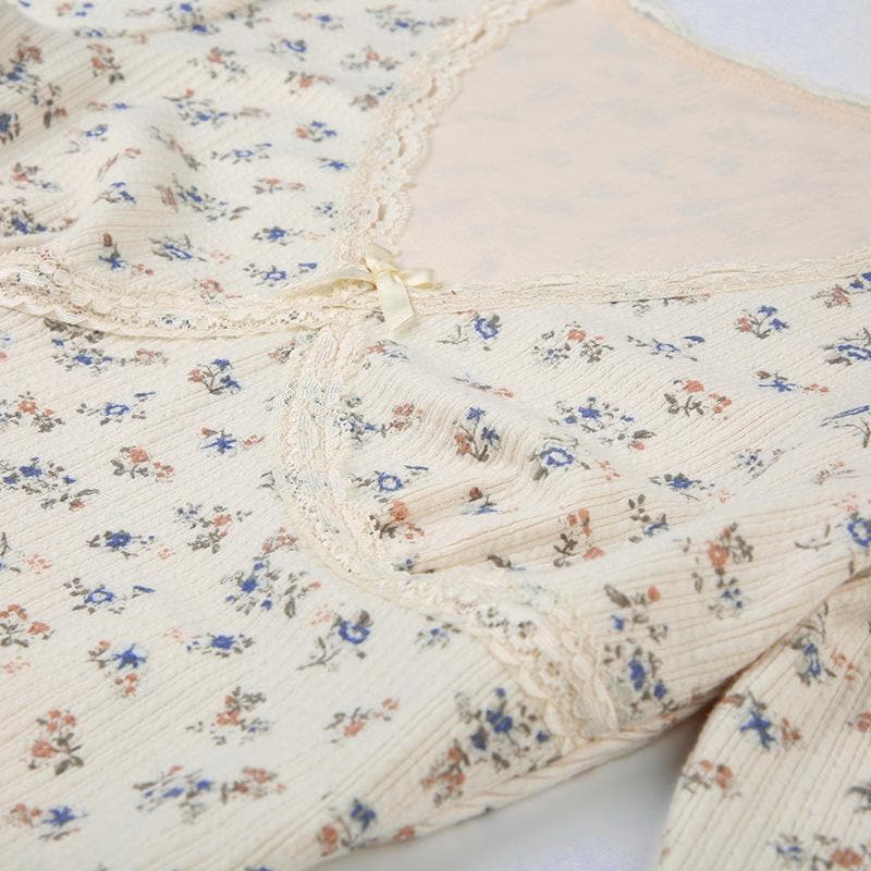 Flower print contrast long sleeve v neck lace hem top