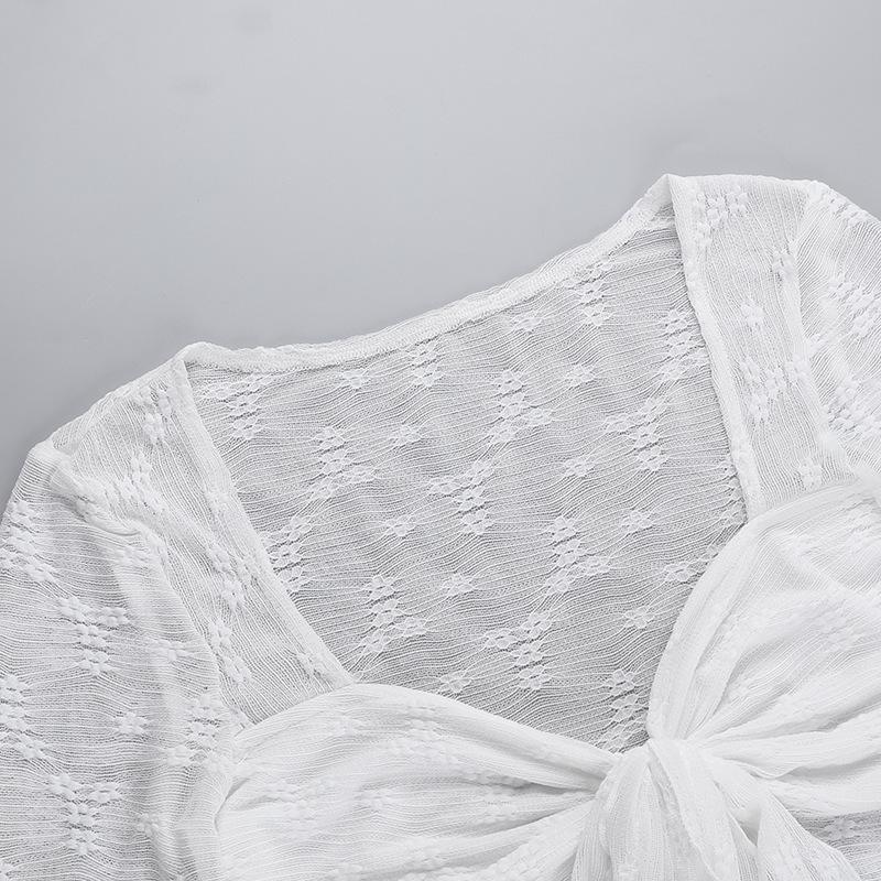 Long sleeve knotted flower pattern top