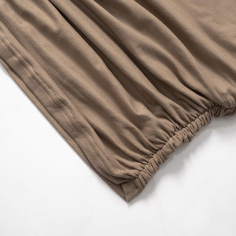 Short sleeve irregular ruched solid top