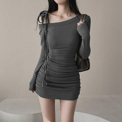 Long sleeve off shoulder self tie solid mini dress