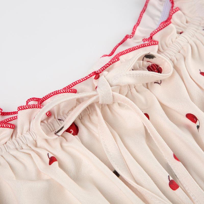Short puff sleeve knotted ruched cherry print bodysuit