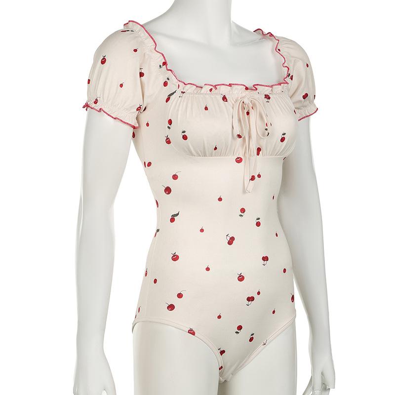 Short puff sleeve knotted ruched cherry print bodysuit
